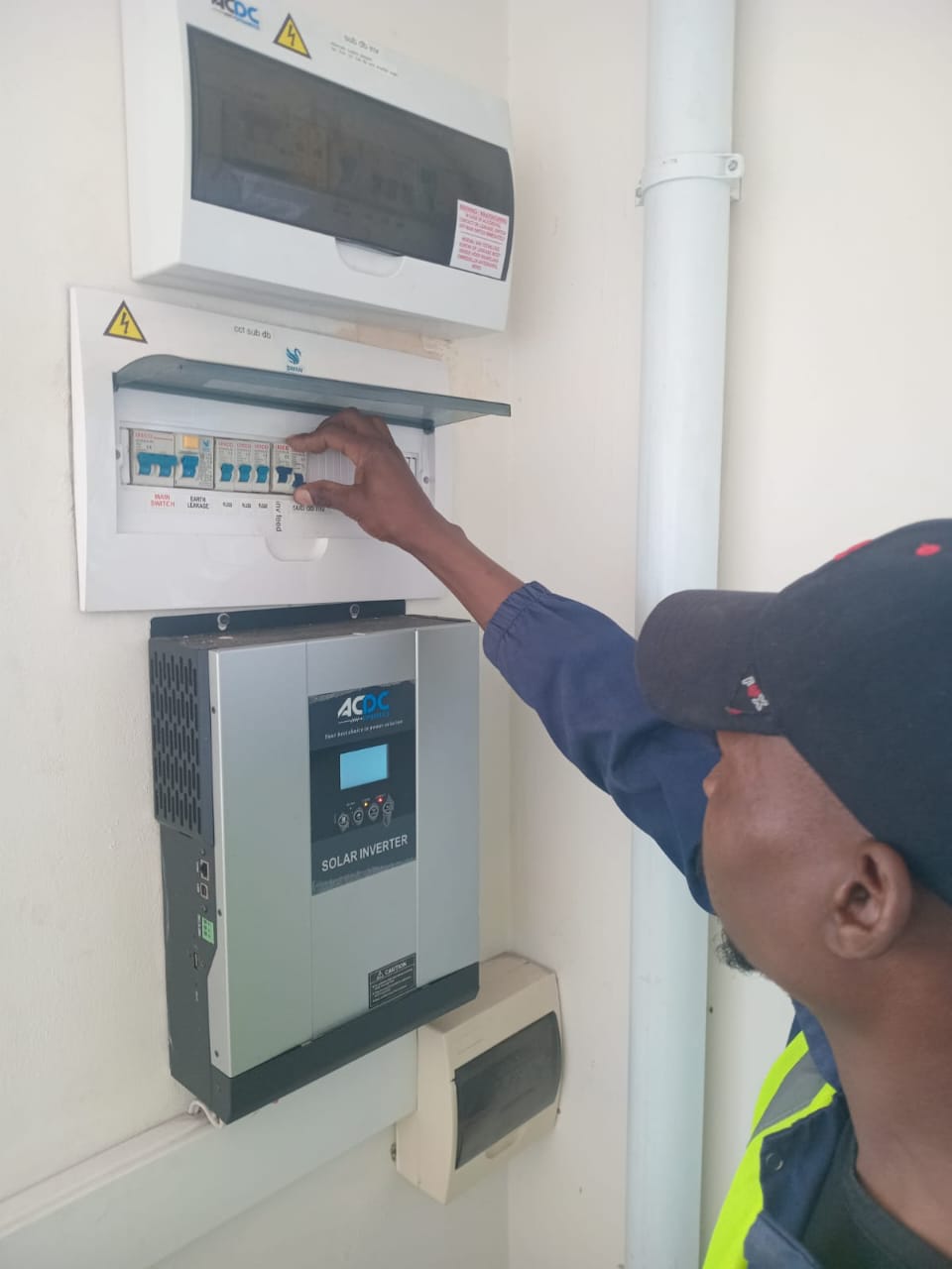 Solar inverter and sub distribution board installed and being tested